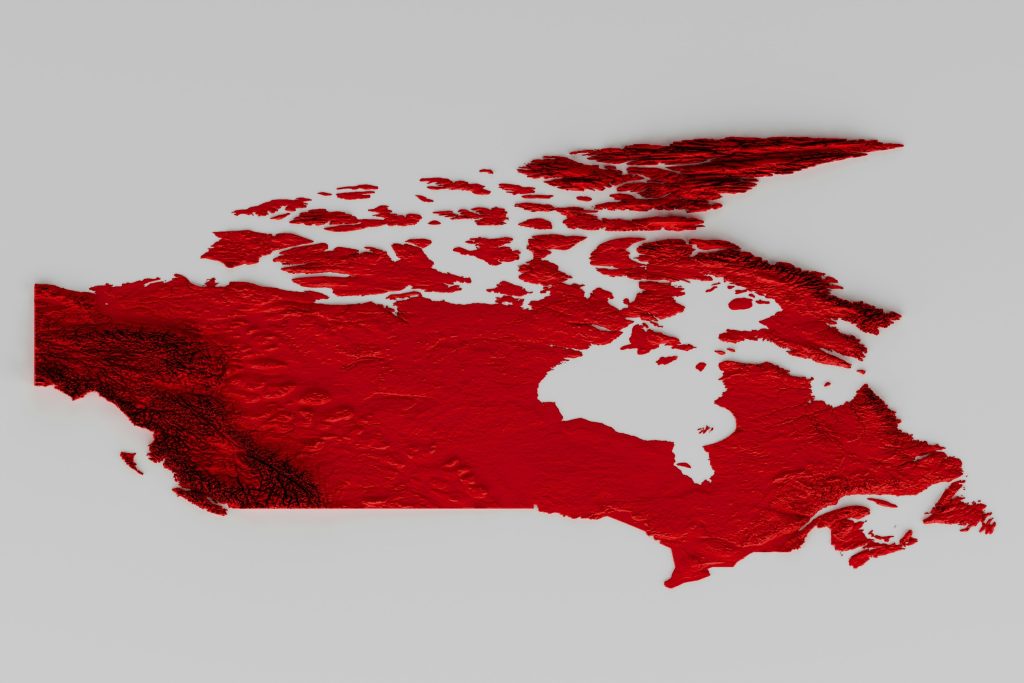 a map of Canada all in red against a white background. The map is laid flat so that you're seeing it from the bottom left section of Canada. 
